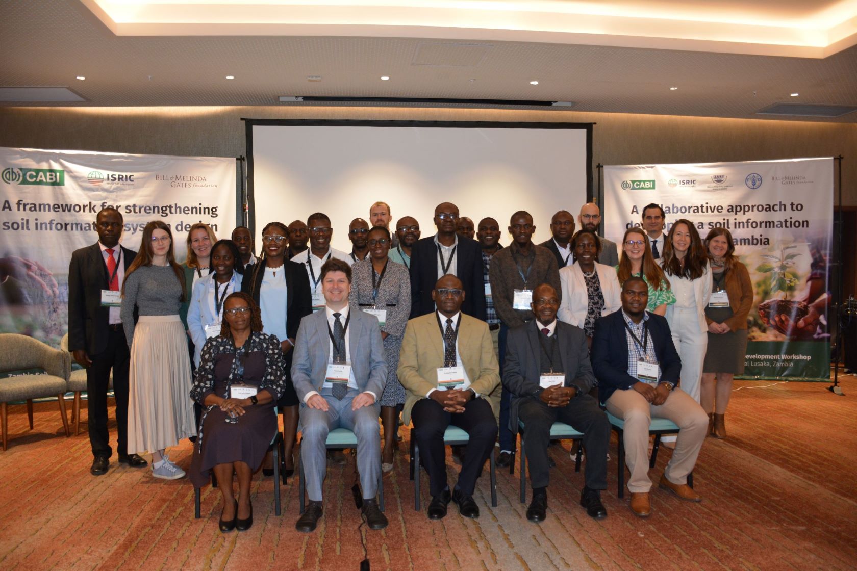 A group of CABI, ISRIC and Zambia stakeholders seated at a workshop in Zambia.